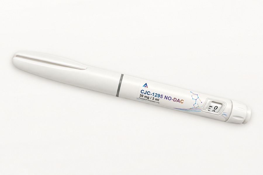 White Aevamere CJC-1295 no-DAC pen labelled 30 mg / 3 ml, angled on an ivory studio surface.