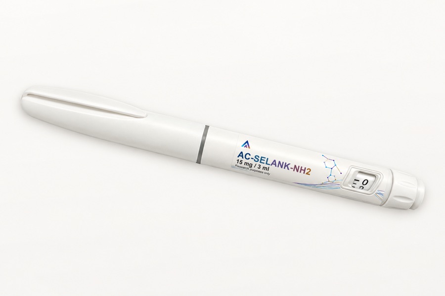 White Aevamere AC-Selank-NH2 pen labelled 15 mg / 3 ml, angled on an ivory studio surface.