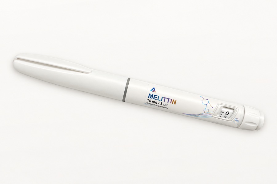 White Aevamere Melittin pen labelled 15 mg / 3 ml, angled on an ivory studio surface.